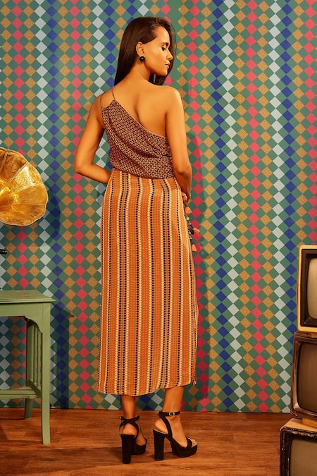 Shop Sandhya Shah Multi Color Crepe, Linen Tassels One Seira Printed Top With Slit Skirt at Aza Fashions Shop_Sandhya Shah_Multi Color Crepe, Linen Tassels One Seira Printed Top With Slit Skirt _at_Aza_Fashions