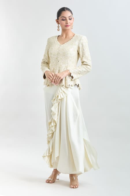 Shop Anamika Khanna Ivory Sequins, Embroidery V-neck Peplum Jacket And Frilled Skirt Set Online at Aza Fashions Shop_Anamika Khanna_Ivory Sequins, Embroidery V-neck Peplum Jacket And Frilled Skirt Set_Online_at_Aza_Fashions
