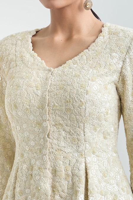 Anamika Khanna Ivory Sequins, Embroidery V-neck Peplum Jacket And Frilled Skirt Set at Aza Fashions Anamika Khanna_Ivory Sequins, Embroidery V-neck Peplum Jacket And Frilled Skirt Set_at_Aza_Fashions