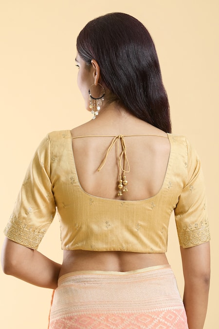 Shop Naintara Bajaj Gold Silk Embroidery Round Neck Floral Pattern Blouse at Aza Fashions Shop_Naintara Bajaj_Gold Silk Embroidery Round Neck Floral Pattern Blouse _at_Aza_Fashions