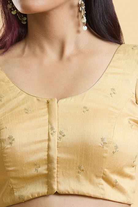 Naintara Bajaj Gold Silk Embroidery Round Neck Floral Pattern Blouse at Aza Fashions Naintara Bajaj_Gold Silk Embroidery Round Neck Floral Pattern Blouse _at_Aza_Fashions