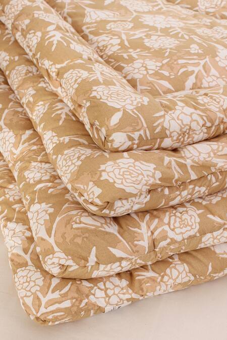 Shop House This Beige 100% Cotton, Polyfill Printed Genda Phool Double Comforter Online at Aza Fashions Shop_House This_Beige 100% Cotton, Polyfill Printed Genda Phool Double Comforter_Online_at_Aza_Fashions