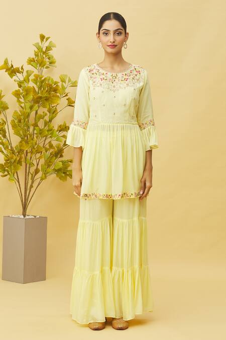 Samyukta Singhania_Yellow Bamboo, Silk, Chiffon Cut Work, Sequins, Floral Peplum Top Sharara Set_Online_at_Aza_Fashions