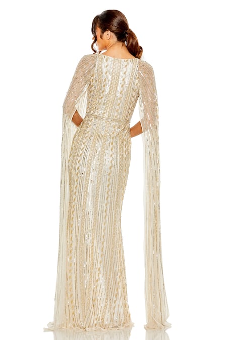 Shop Mac Duggal Beige Polyester Sequins, Cut Work V-neck Lolite Space Embroidered Gown at Aza Fashions Shop_Mac Duggal_Beige Polyester Sequins, Cut Work V-neck Lolite Space Embroidered Gown _at_Aza_Fashions