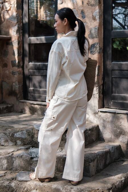 Shop The Terra Tribe Off White Organic Cotton Solid Plain Parachute Trousers at Aza Fashions Shop_The Terra Tribe_Off White Organic Cotton Solid Plain Parachute Trousers_at_Aza_Fashions