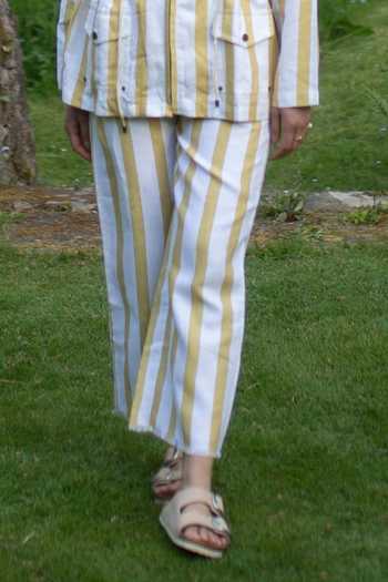 Buy_The Terra Tribe_Yellow Linen Twill Printed Stripe Infinity Flared Pant_Online_at_Aza_Fashions