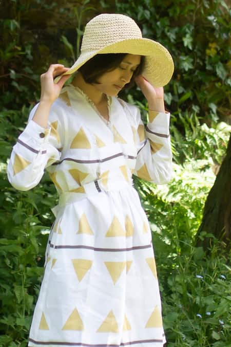 Buy The Terra Tribe Yellow Linen Printed Tribal V Neck Hawai Shift Dress Online at Aza Fashions Buy_The Terra Tribe_Yellow Linen Printed Tribal V Neck Hawai Shift Dress_Online_at_Aza_Fashions