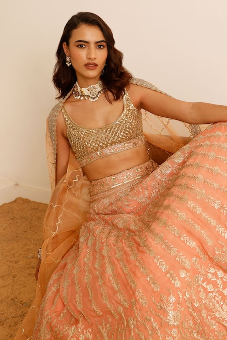 Buy Studio Iris India Peach Organza Sequins, Foil Printing Camelia Work Floral Bridal Lehenga Set Online at Aza Fashions Buy_Studio Iris India_Peach Organza Sequins, Foil Printing Camelia Work Floral Bridal Lehenga Set _Online_at_Aza_Fashions