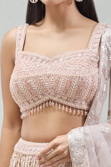 Meenagurnam_Rose Gold Net, Georgette Sequins, Beads Sweetheart Neck And Work Lehenga Set _at_Aza_Fashions