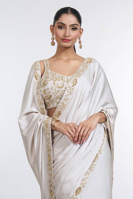 Meenagurnam_Ivory Net, Satin, Silk Sequins, Beads Sweetheart Neck And Work Border Saree Set_at_Aza_Fashions