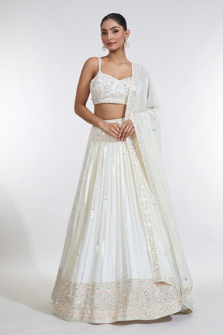 Buy Ivory Net Embroidery Sequin Sweetheart Neck Mirror Ray Lehenga Set ...