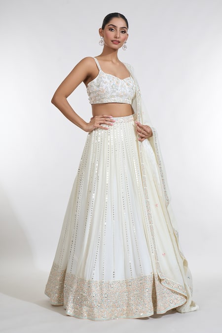 Buy_Meenagurnam_Ivory Net Beads, Sequins, Mirrors Sweetheart Neck Ray Embroidered Lehenga Set _Online_at_Aza_Fashions