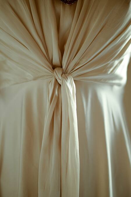 Pavone By Akanksha Chopra_Off White Satin Cut Work, Embroidery High Neck Front Tie-up Gown _Online_at_Aza_Fashions