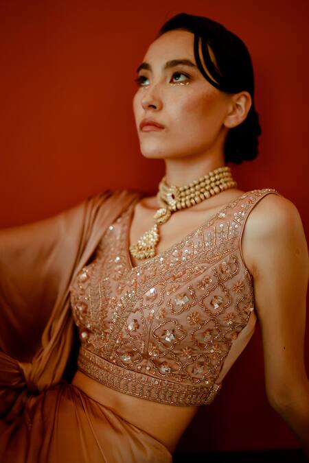 Pavone By Akanksha Chopra_Gold Satin Sequins, Cut Work, Mirrors V-neck Solid Pre-draped Saree With Blouse _at_Aza_Fashions