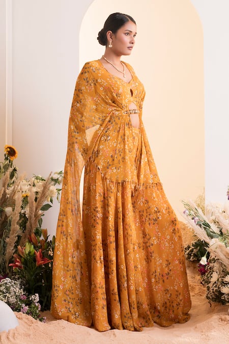 Buy Presto Couture Yellow Chiffon Tassels V-neck Floral Print Cape Blouse With Sharara Online at Aza Fashions Buy_Presto Couture_Yellow Chiffon Tassels V-neck Floral Print Cape Blouse With Sharara _Online_at_Aza_Fashions