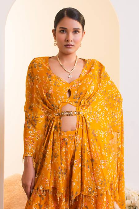 Shop Presto Couture Yellow Chiffon Tassels V-neck Floral Print Cape Blouse With Sharara Online at Aza Fashions Shop_Presto Couture_Yellow Chiffon Tassels V-neck Floral Print Cape Blouse With Sharara _Online_at_Aza_Fashions