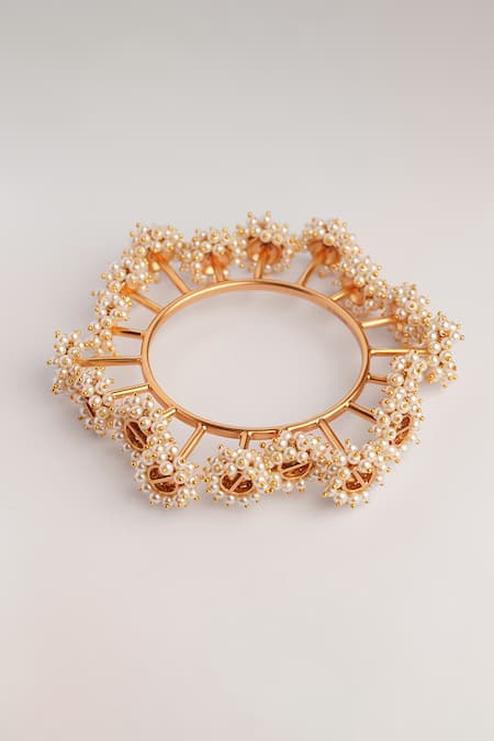 Shop Suhani Pittie Gold Plated Pearls Embellished Bangle at Aza Fashions Shop_Suhani Pittie_Gold Plated Pearls Embellished Bangle _at_Aza_Fashions