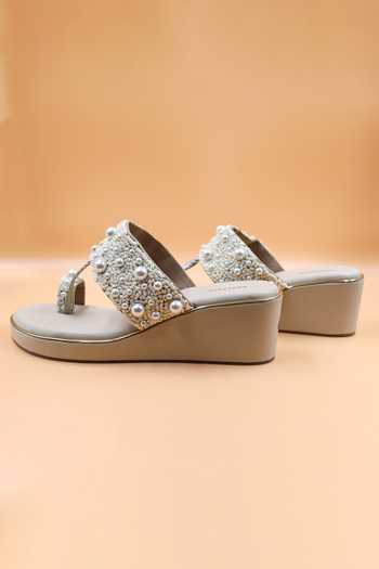 Shop Foot Fuel Beige Sequins, Beads, Zari Maya Embellished Kolhapuri Wedges at Aza Fashions Shop_Foot Fuel_Beige Sequins, Beads, Zari Maya Embellished Kolhapuri Wedges _at_Aza_Fashions