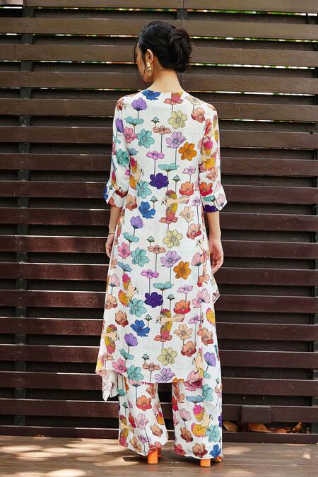 Shop Nautanky White Crepe Embroidery, Beads V-neck Floral Print Asymmetric Kurta With Pant at Aza Fashions Shop_Nautanky_White Crepe Embroidery, Beads V-neck Floral Print Asymmetric Kurta With Pant _at_Aza_Fashions