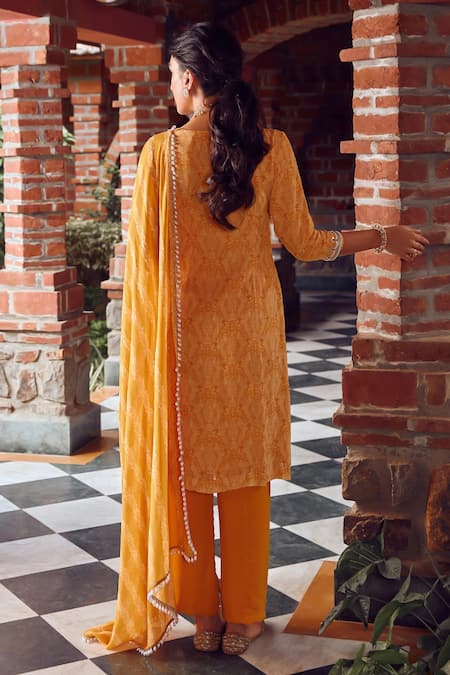 Shop_Ritika Verma_Yellow Georgette, Crepe, Linen Cut Work, Embroidery, Tassels Zahra Angrakha Set _at_Aza_Fashions