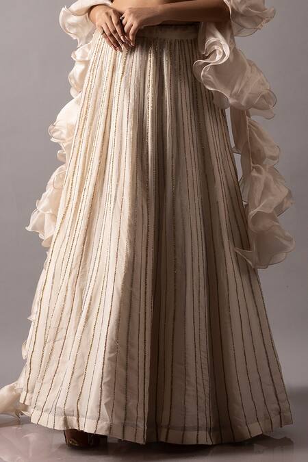 Ellemora Fashions_Ivory Satin, Net, Organza Pearls, Sequins, Charm Stripe Embellished Lehenga Set _at_Aza_Fashions