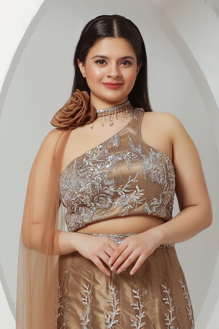 Shop Ellemora Fashions Gold Net Sequins, Cut Work One Shoulder Embroidered Fishcut Lehenga Set Online at Aza Fashions Shop_Ellemora Fashions_Gold Net Sequins, Cut Work One Shoulder Embroidered Fishcut Lehenga Set_Online_at_Aza_Fashions