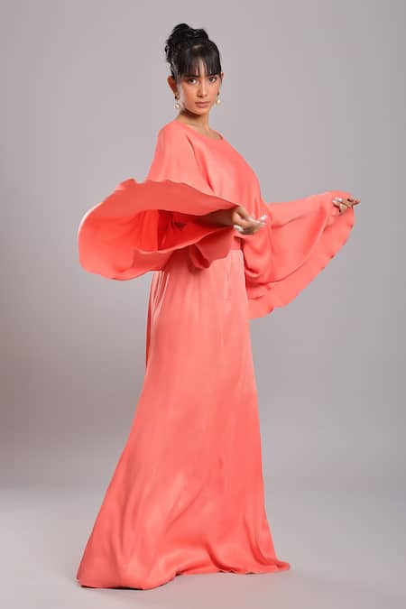 Shop_Ellemora Fashions_Coral Dull Crepe Plain Boat Neck Layered Cape And Draped Skirt Set _Online_at_Aza_Fashions