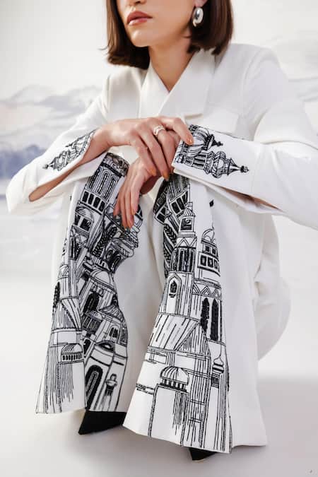 Shop Orthodox White Banana Crepe Embroidery Aari Centurion Chic Border Flared Trouser at Aza Fashions Shop_Orthodox_White Banana Crepe Embroidery Aari Centurion Chic Border Flared Trouser _at_Aza_Fashions