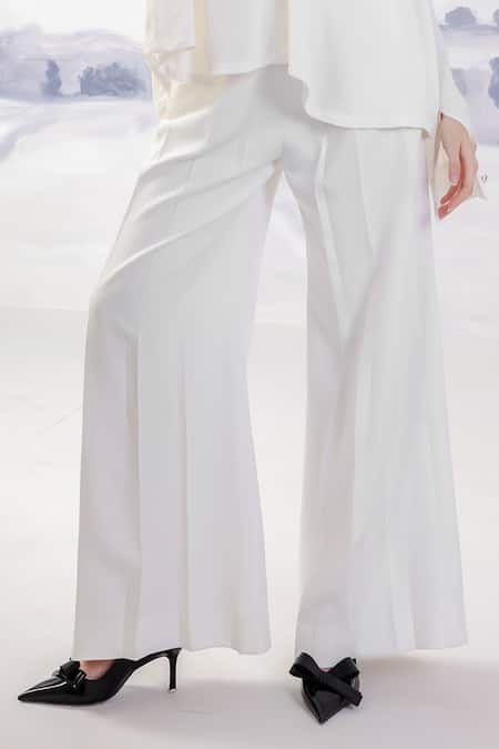 Orthodox_White Banana Crepe Flared Solid Trouser _Online_at_Aza_Fashions