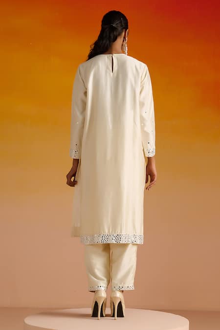 Shop OHH CROW Ivory Silk, Cotton Beads, Mirrors, Embroidery Round Neck And Hand Kurta Pant Set at Aza Fashions Shop_OHH CROW_Ivory Silk, Cotton Beads, Mirrors, Embroidery Round Neck And Hand Kurta Pant Set _at_Aza_Fashions