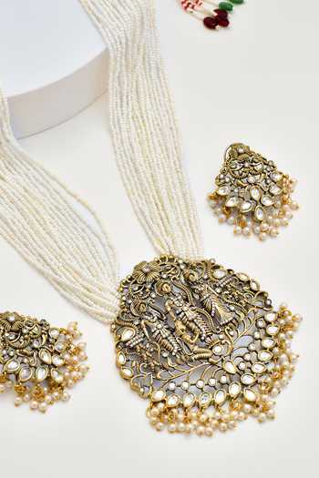 Shop_Swabhimann_Gold Plated Pearls Carved Temple Necklace Set _Online_at_Aza_Fashions