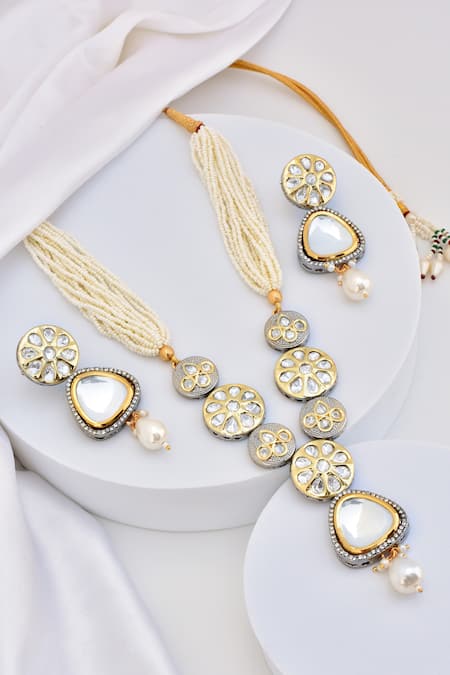 Swabhimann Carved Kundan Embellished Pendant Necklace Set 