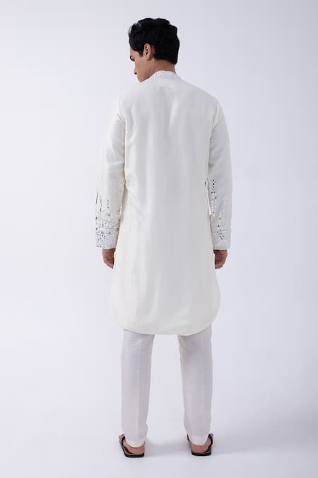 Shop Kaka Calcutta Ivory Bamboo, Cotton, Silk Mirrors Embellished Hem Kurta With Pyjama at Aza Fashions Shop_Kaka Calcutta_Ivory Bamboo, Cotton, Silk Mirrors Embellished Hem Kurta With Pyjama _at_Aza_Fashions