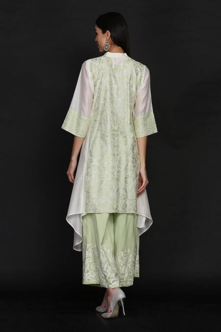 Shop Anju & Harleen Ivory Silk, Chanderi, Linen Embroidery, Resham Asymmetric Kurta Flared Pant Set at Aza Fashions Shop_Anju & Harleen_Ivory Silk, Chanderi, Linen Embroidery, Resham Asymmetric Kurta Flared Pant Set _at_Aza_Fashions