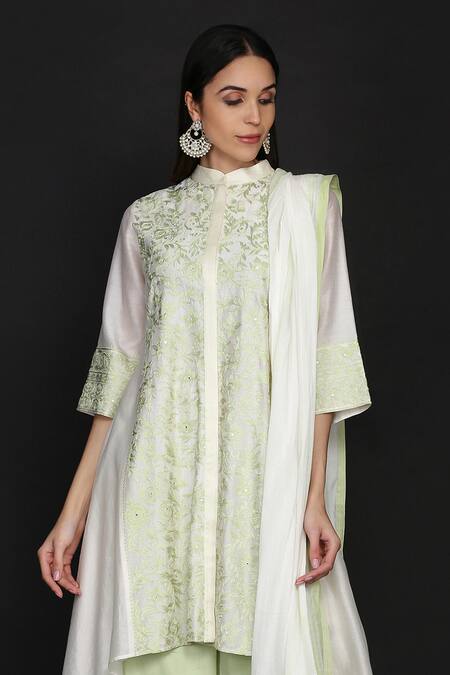 Anju & Harleen Ivory Silk, Chanderi, Linen Embroidery, Resham Asymmetric Kurta Flared Pant Set at Aza Fashions Anju & Harleen_Ivory Silk, Chanderi, Linen Embroidery, Resham Asymmetric Kurta Flared Pant Set _at_Aza_Fashions