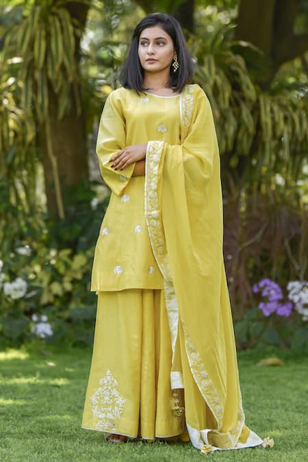 Shop Anju & Harleen Yellow Chanderi, Linen Embroidery Round Neck Dori Kurta Sharara Set at Aza Fashions Shop_Anju & Harleen_Yellow Chanderi, Linen Embroidery Round Neck Dori Kurta Sharara Set _at_Aza_Fashions