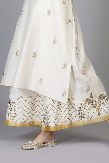 Buy Anju & Harleen Ivory Silk, Chanderi, Linen Embroidery, Zari V-neck Kurta Sharara Set Online at Aza Fashions Buy_Anju & Harleen_Ivory Silk, Chanderi, Linen Embroidery, Zari V-neck Kurta Sharara Set _Online_at_Aza_Fashions