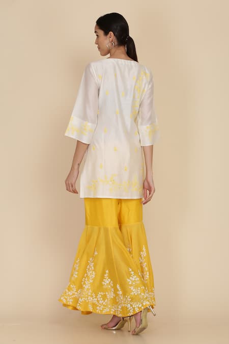 Shop Anju & Harleen Ivory Silk, Net, Chanderi Embroidery Round Neck Dori Floral Kurta Gharara Set at Aza Fashions Shop_Anju & Harleen_Ivory Silk, Net, Chanderi Embroidery Round Neck Dori Floral Kurta Gharara Set _at_Aza_Fashions