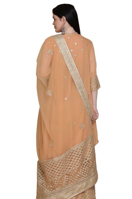 Anju & Harleen_Peach Georgette, Linen Embroidery, Zari Round Neck Flared Kurta Sharara Set _at_Aza_Fashions