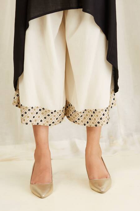 Anju & Harleen_Black Linen Embroidery Boat Neck Asymmetric Back Slit Kurta With Wide Legged _Online_at_Aza_Fashions