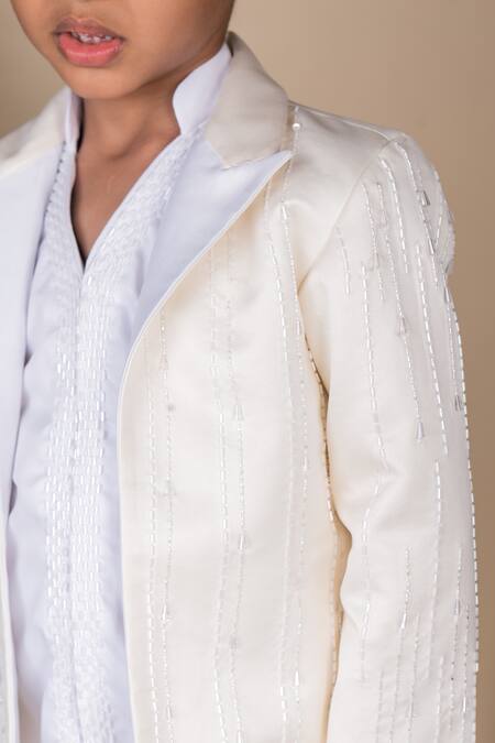 Buy Toplove Cream Satin, Cotton Sequins, Crystals, Beads Hand Embroidered Blazer Pant Set Online at Aza Fashions Buy_Toplove_Cream Satin, Cotton Sequins, Crystals, Beads Hand Embroidered Blazer Pant Set _Online_at_Aza_Fashions