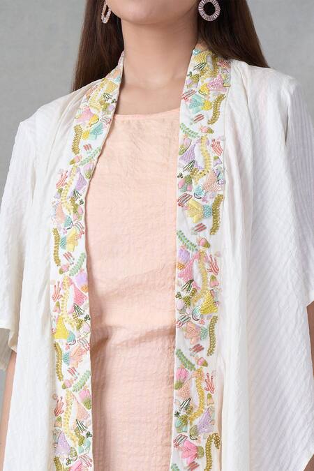 Shop Bhusattva Off White Organic Silk Embroidery Bead Shrug Open Floral Border With Dress Online at Aza Fashions Shop_Bhusattva_Off White Organic Silk Embroidery Bead Shrug Open Floral Border With Dress _Online_at_Aza_Fashions