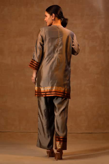 Shop Eeda Black Silk High Neck Striped Kurta And Pant Set at Aza Fashions Shop_Eeda_Black Silk High Neck Striped Kurta And Pant Set _at_Aza_Fashions