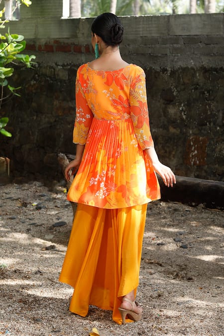 Shop Harshita Singhvi Yellow Georgette, Crepe, Net Cut Work, Embroidery, Floral Print Peplum Kurta Set at Aza Fashions Shop_Harshita Singhvi_Yellow Georgette, Crepe, Net Cut Work, Embroidery, Floral Print Peplum Kurta Set _at_Aza_Fashions