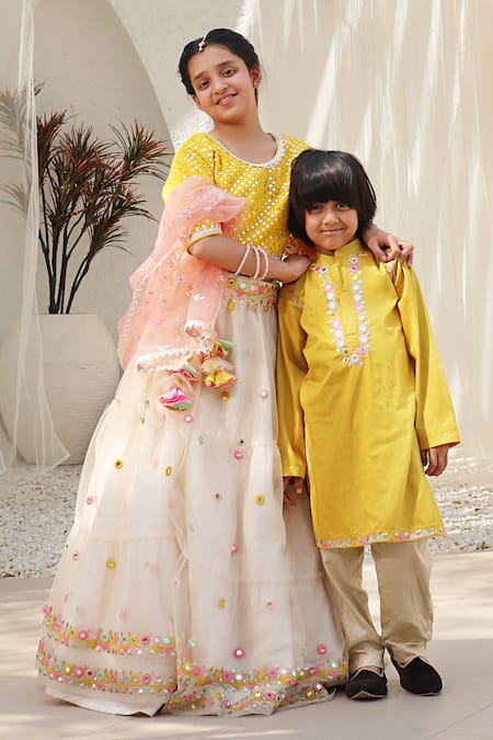 Fayon Kids Ivory Net Mirrors Embroidered Lehenga Set Online at Aza Fashions Fayon Kids_Ivory Net Mirrors Embroidered Lehenga Set _Online_at_Aza_Fashions