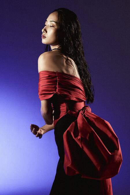 Manika Nanda Red Taffeta, Crepe Bows Off-shoulder Colorblocked Off Trumpet Gown at Aza Fashions Manika Nanda_Red Taffeta, Crepe Bows Off-shoulder Colorblocked Off Trumpet Gown _at_Aza_Fashions