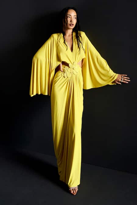 Shop Manika Nanda Yellow Lycra Embroidery Plunge Neck 3d Buttercup Bloom Embellished Gown at Aza Fashions Shop_Manika Nanda_Yellow Lycra Embroidery Plunge Neck 3d Buttercup Bloom Embellished Gown _at_Aza_Fashions