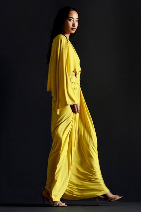 Shop Manika Nanda Yellow Lycra Embroidery Plunge Neck 3d Buttercup Bloom Embellished Gown Online at Aza Fashions Shop_Manika Nanda_Yellow Lycra Embroidery Plunge Neck 3d Buttercup Bloom Embellished Gown _Online_at_Aza_Fashions