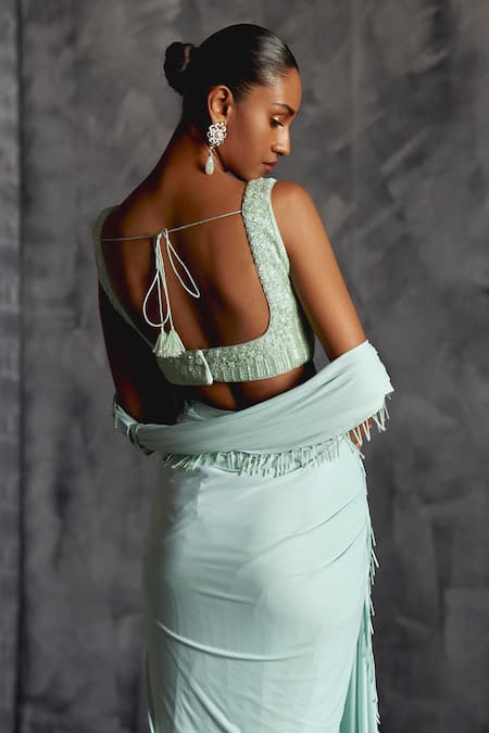 Shop Manika Nanda Blue Silk, Lycra Nalki Tassel Embellished Border Pre-draped Saree With Blouse at Aza Fashions Shop_Manika Nanda_Blue Silk, Lycra Nalki Tassel Embellished Border Pre-draped Saree With Blouse _at_Aza_Fashions