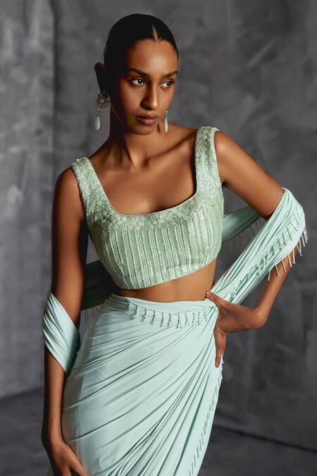 Buy Manika Nanda Blue Silk, Lycra Nalki Tassel Embellished Border Pre-draped Saree With Blouse Online at Aza Fashions Buy_Manika Nanda_Blue Silk, Lycra Nalki Tassel Embellished Border Pre-draped Saree With Blouse _Online_at_Aza_Fashions